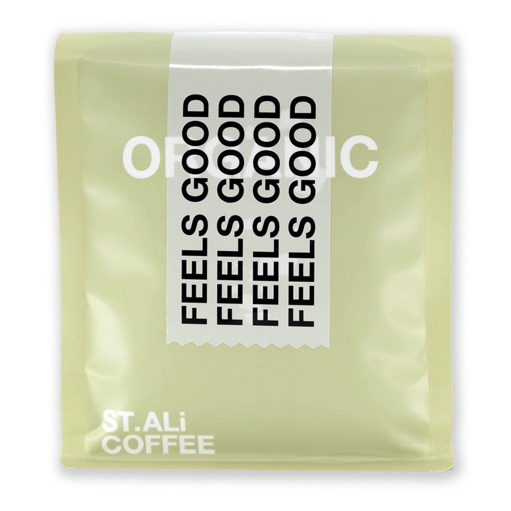 A pale green 250 gram bag of coffee with white & black text