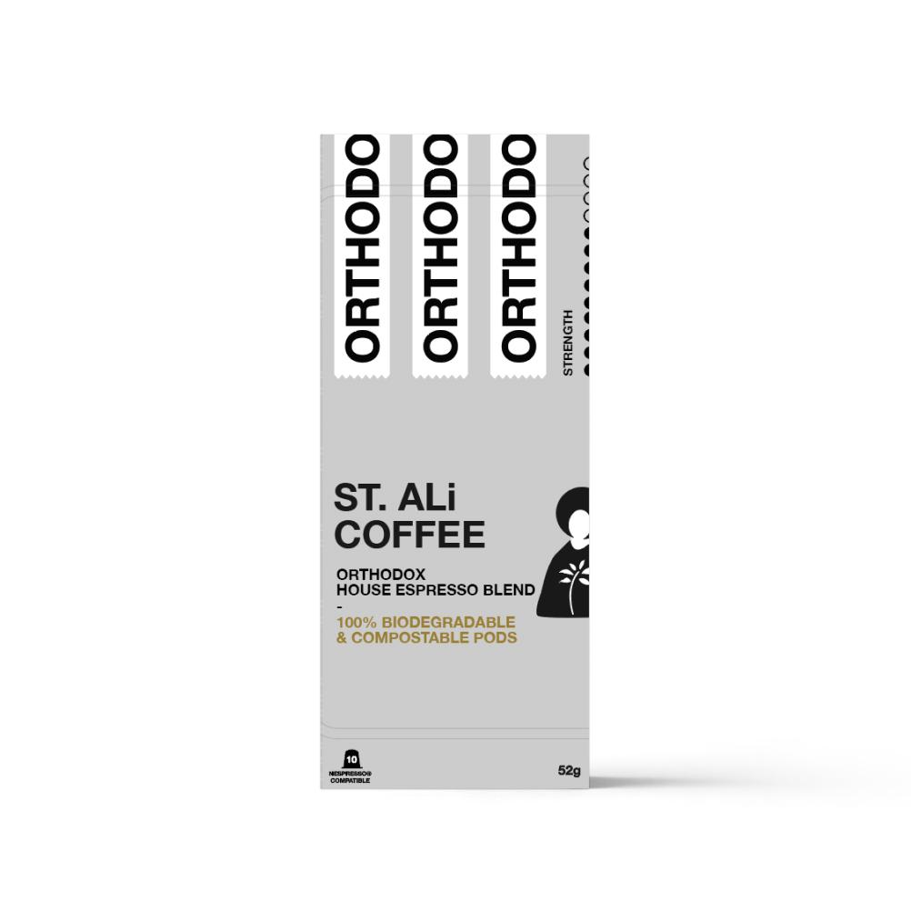 A grey rectangular upright box with black text and a illustration of a Nun like figure.