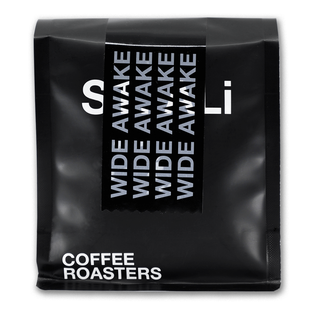 A black 250 gram bag of coffee with white text.