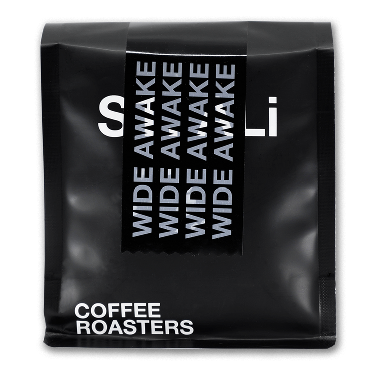 A black 250 gram bag of coffee with white text.